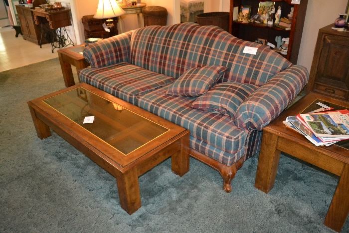 Wood framed couch in excellent condition. Glass top living room table set including coffee table and two side tables. 