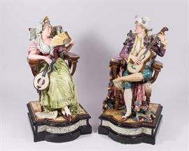 Lot 31: Pair of Majolica Seated Figures