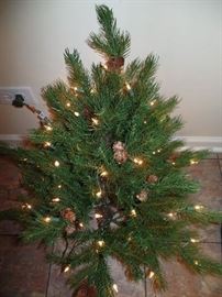 Frontgate fold up pre-lite w/pine cones Christmas tree w/stoarge bag on wheels (this is the top of the tree)