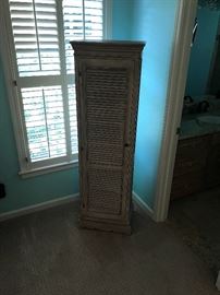 linen storage unit made of a plantation style shutter