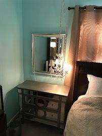 mirrored bedside chest (has some damage), silver framed mirror