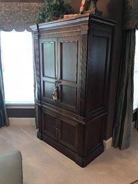large media armoire. quickly converts into a perfect closet for linens of a guestroom