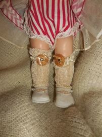 Look at her stockings..shoes say fairyland USA 