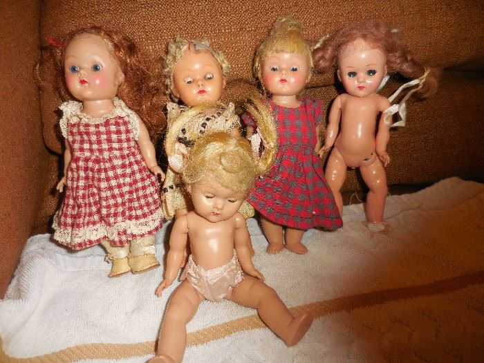 All the dolls are VOGUE..except for end naked doll with white painted shoes..she is generic..but cute!