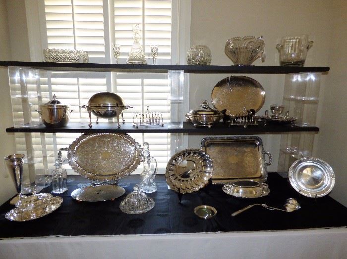 Table of Silverplate serving pieces, Crystal items including Waterford