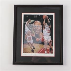 Signed Limited Edition Michael Jordan Lithograph After Angelo Martino: A signed limited edition lithograph after a painting of Michael Jordan by Angeo Martino. This print depicts the famous Chicago Bulls basketball player in a variety of positions around a portrait of his bust. The print is signed in-print to the lower left corner, editioned in graphite A.E. 135/500 to the lower left corner, and signed in graphite the lower center margin. The print is housed in a plastic frame with double black and red matting.