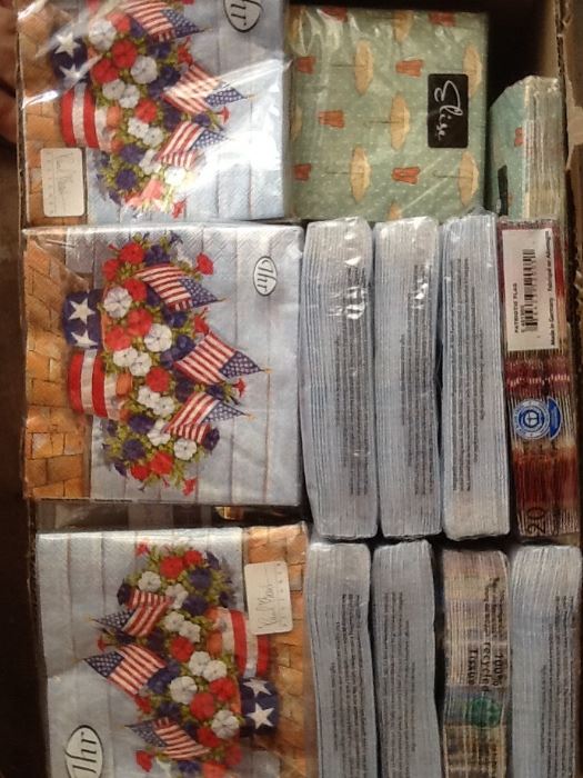 selection of paper napkins, still wrapped, in new condition