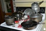 cast iron skillets, club aluminum, spice tins