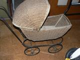 Antique wicker doll baby buggy