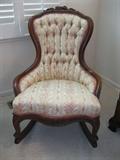 Victorian Floral White and pink print apolster rocking chair with no arms; H: 37"; D: 18"; L: 23"