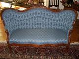 Victorian Love seat with orginial upholstry and framing. H: 36"; D: 26"; L: 61"