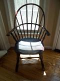 LATE 18TH CENTURY-EARLY 19TH CENTURY AMERICAN RHODE ISLAND KNUCKLE-ARM WINDSOR CHAIR. Black painted; six shapedspindles; scooped seat; splayed legs connected by H-stretcher. H: 37"; Seat H: 16 1/2"; D:16"; W: 23"