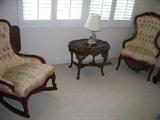 Victorian Floral White and pink print apolster rocking chair with no arms; H: 37"; D: 18"; L: 23"