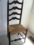 EARLY 19TH CENTURY AMERICAN ARROW BACK WINDSOR SIDE CHAIR. Four shaped arched back slats. Black painted. Bamboo-turned legs, feet. H: 40"; Seat H: 16 1/2"; D: 13 1/2"; W: 17"