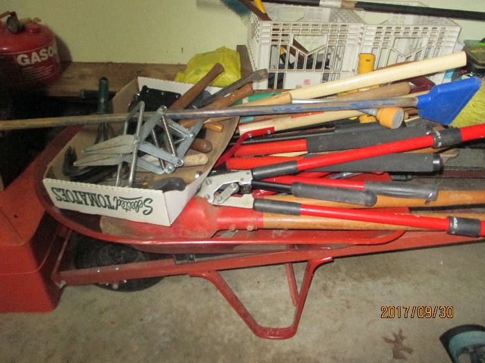 Garden tools and wheelbarrow