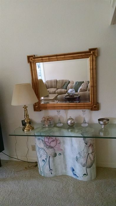 sofa table , wall mirror , brass lamp 