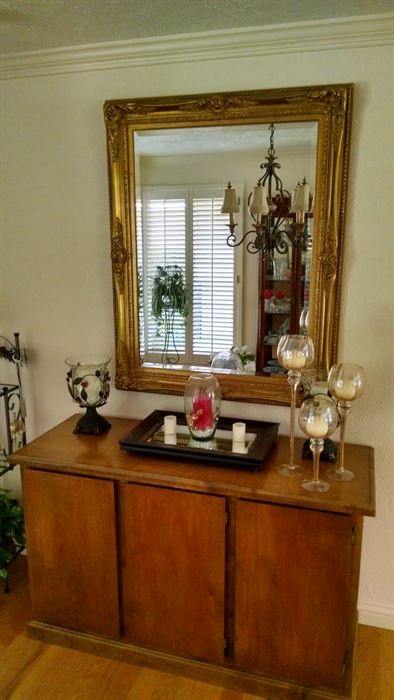 nice large gold mirror  sideboard , home decor candles 