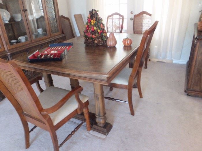 Dining table with 6 chairs and 3 leafs.  