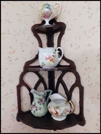 Vintage corner shelf with collectible hand painted porcelain  pitchers