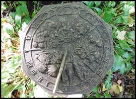 Octagonal sundial 10 inch garden themed. This would fit on the old English chimney pot that is also for sale.