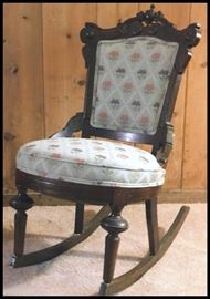 Beautifully carved and newly reupholstered Victorian petite sewing or nursing rocking chair