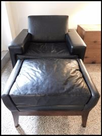 Oversized black leather chair and ottoman