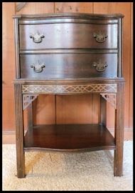  Small antique side table with ornate carvings and beautiful hardware