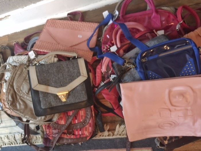 Literally HUNDREDS AND HUNDREDS of handbags