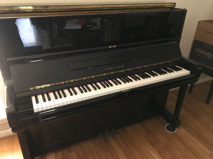 Young Chang Upright piano (the nextdoor neighbor that is wanting to sell)  It's Model U-121 and is absolutely beautiful.  She's wanting $1,400, but let us know and we will give you her telephone number to call and visit with her.