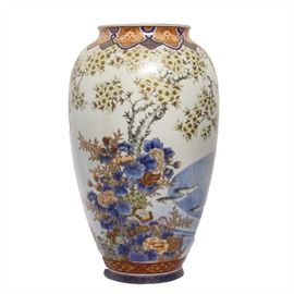 Antique Japanese Fukagawa Vase: An antique Japanese Fukagawa ware vase. This finely painted urn is decorated with blooming peonies. chrysanthemums, and cherry blossoms alongside delicate songbirds and swimming fish. It is marked “Made by Fukagawa” (深川製) alongside a Koransha orchid mark. The piece likely dates from the late Meiji period (1868-1912).