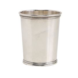 Mark J. Scearce Sterling Mint Julep Cup: A vintage sterling silver mint julep cup by Mark J. Scearce. This cup features a banded rim and base with beaded accents. To the underside, the cup features an eagle cartouche with initials for Dwight D. Eisenhower, the 34th President of the United States. It has an approximate weight of 4.615 ozt.