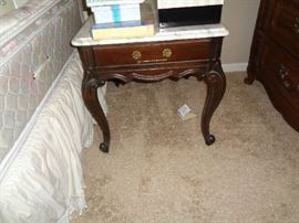 pair of these marble topped table