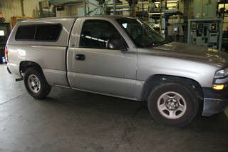2001 1500 CHEVY TRUCK WITH CAMPER SHELL.