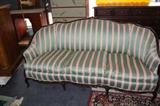 8 Leg Sofa has been reupholstered and
is currently sold today in the new stores.
This one is an Antique and in great conditon.