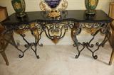 6 FT LONG BLACK MARBLE TOP WITH ORNATE IRON BASE AND GOLD TRIM. STUNNING.