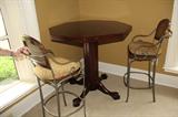 PUB TABLE AND TWO IRON STOOLS