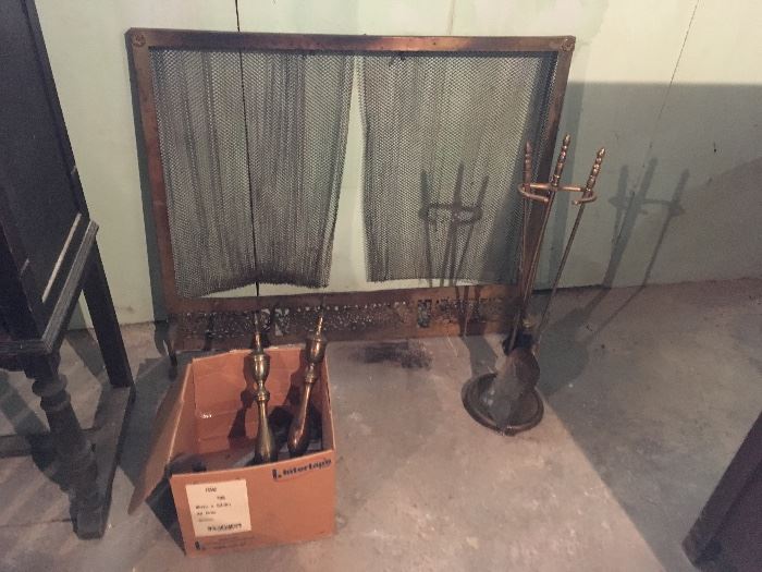 fireplace screen with andirons and tools
