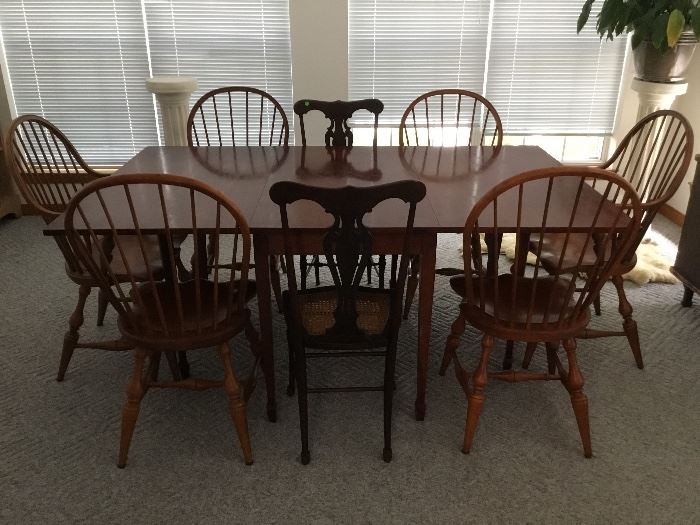 Cherry drop leaf table , six chairs priced separately, can seat 8. 