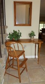 nice old child's chair and a delicate small table