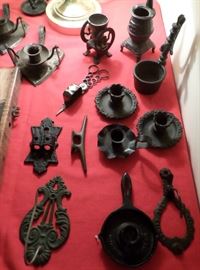 collection of antique cast iron items