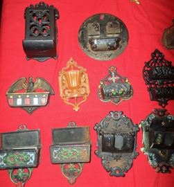 more antique cast iron items, including many match holders