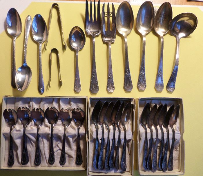 some of the silver plate flatware available, most of the silver plate is by Holmes & Edwards in the "Carolina" pattern