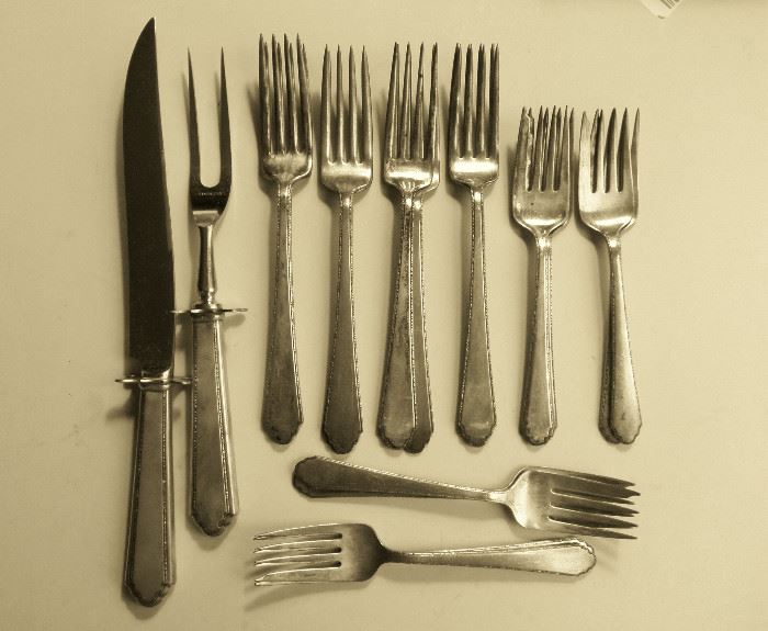 some of the Sterling flatware , the flatware is in the "William & Mary" pattern