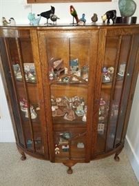 Another Curio Cabinet with birds and other collectibles