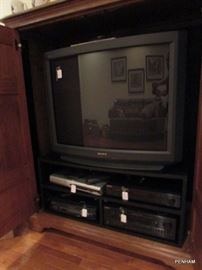 Large TV and several Sony electronic pieces.