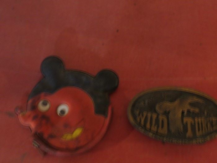 MICKEY MOUSE COIN PURSE ON LEFT.