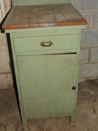 COOL COUNTRY MID CENTURY CABINET WITH HARD WOOD FLOORING TOP.