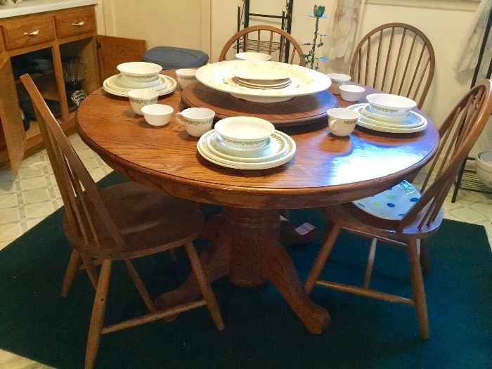 Corelle Dishes.                                                               Oak table and chairs 