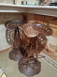Bar stools of metal.
