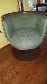 One of a Pair of Swivel Mid Century Chairs